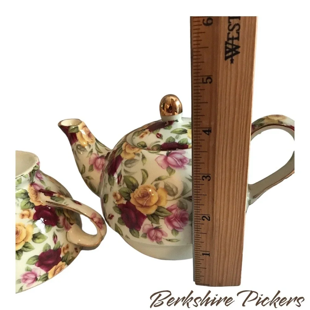 Chintz Floral stacking teapot and cup made in the PRC‎